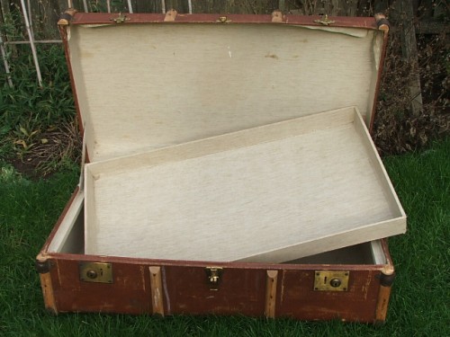 Vintage wooden banded luggage trunk