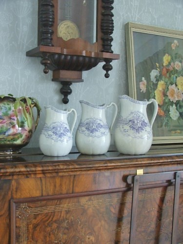 Three Wreath Pottery Jugs