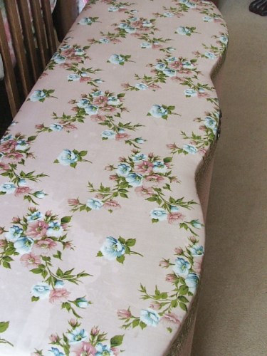Pretty vintage pink floral wicker ottomon